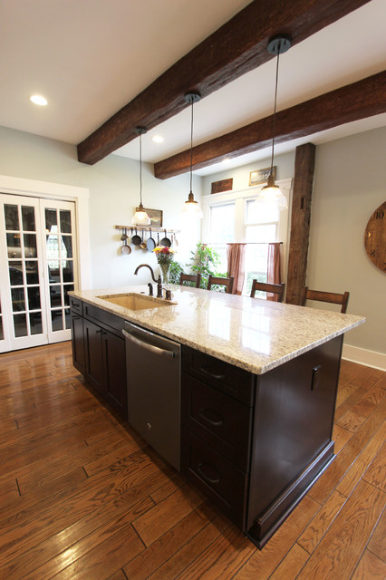 Painted Cream With Brown Glaze Cabinets With Giallo Granite