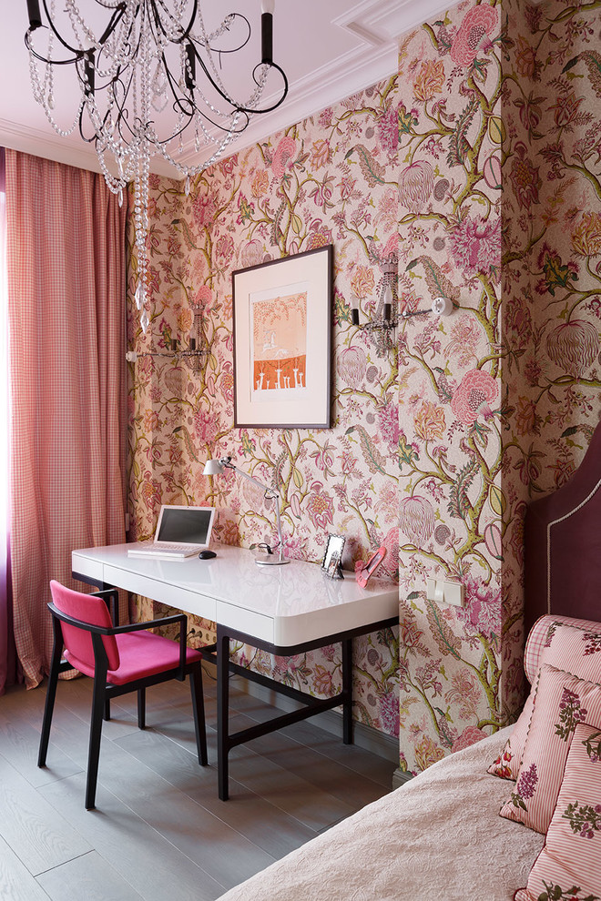 Photo of an eclectic bedroom in London with pink walls, light hardwood floors and grey floor.