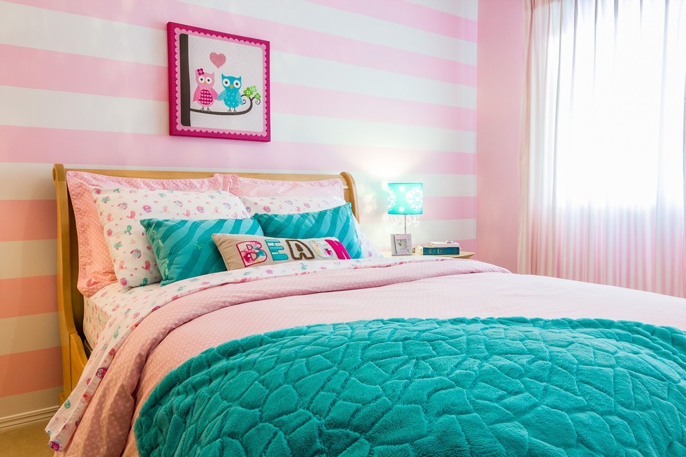 Design ideas for a mid-sized transitional bedroom in Other with pink walls.