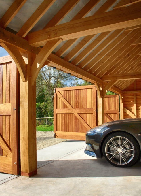 inside a classic oak framed barn - traditional - garage