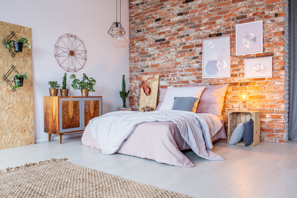 This is an example of an industrial bedroom in Brussels with red walls and white floor.