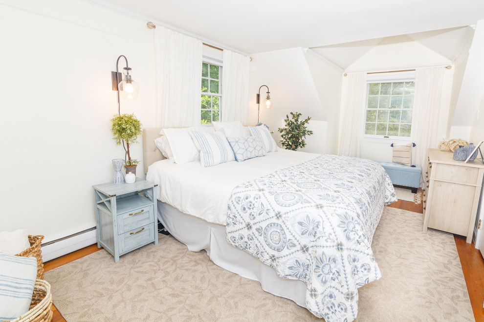 Design ideas for a small country master bedroom in Boston with white walls.