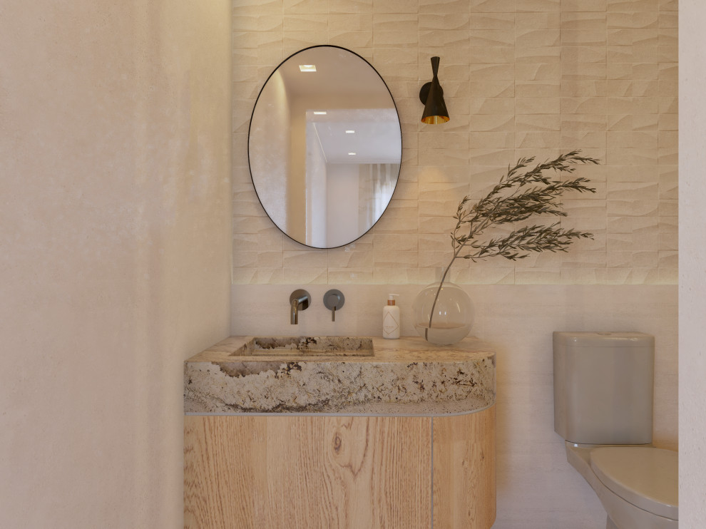This is an example of a small modern master wet room bathroom in Madrid with flat-panel cabinets, medium wood cabinets, a one-piece toilet, beige tile, porcelain floors, a wall-mount sink, marble benchtops, brown benchtops, a single vanity and a floating vanity.