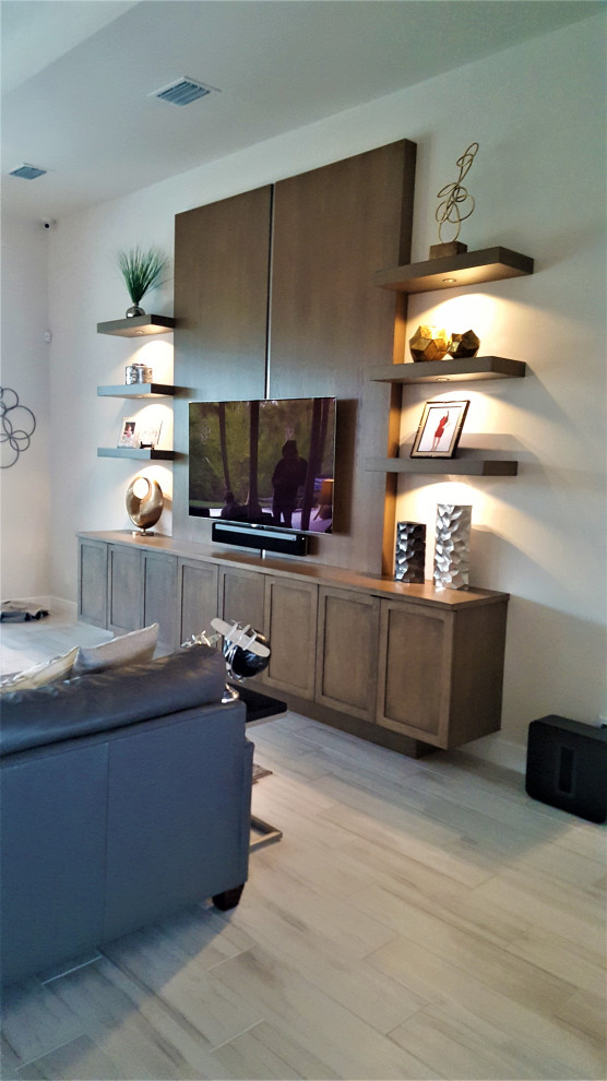 Custom entertainment console with floating shelves in Azure