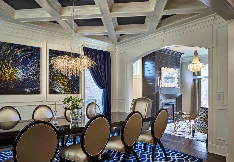 Example of a transitional dark wood floor and brown floor dining room design in Chicago with white walls