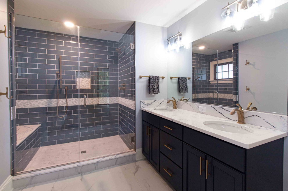 Photo of a mid-sized contemporary master bathroom in Cleveland with shaker cabinets, blue cabinets, a one-piece toilet, grey walls, terra-cotta floors, an undermount sink, quartzite benchtops, white floor, a hinged shower door, multi-coloured benchtops, a shower seat, a double vanity and a freestanding vanity.
