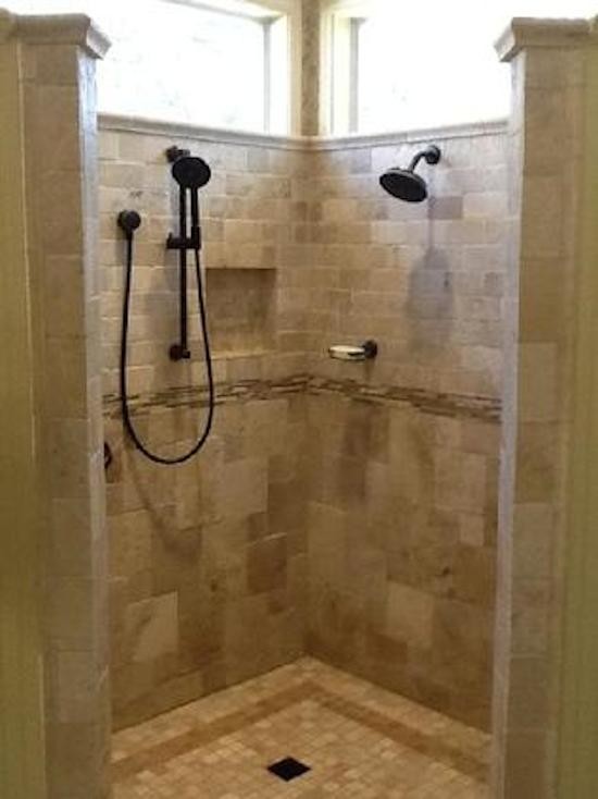 Inspiration for a traditional bathroom in Austin with an open shower, beige tile and terra-cotta tile.
