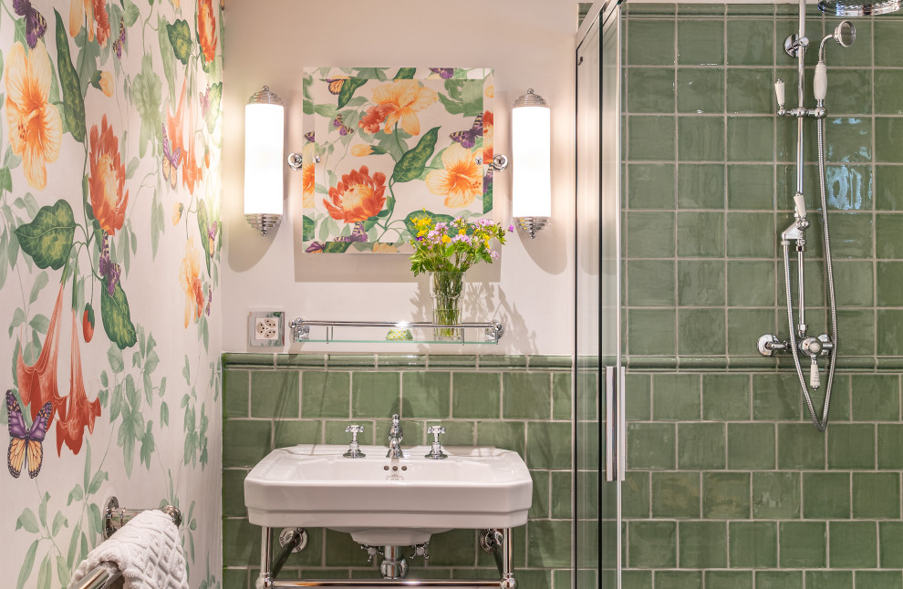 Photo of a medium sized traditional shower room bathroom in Other with a built-in shower, green tiles, green walls, a console sink, an open shower, white worktops, a single sink, a freestanding vanity unit and wallpapered walls.
