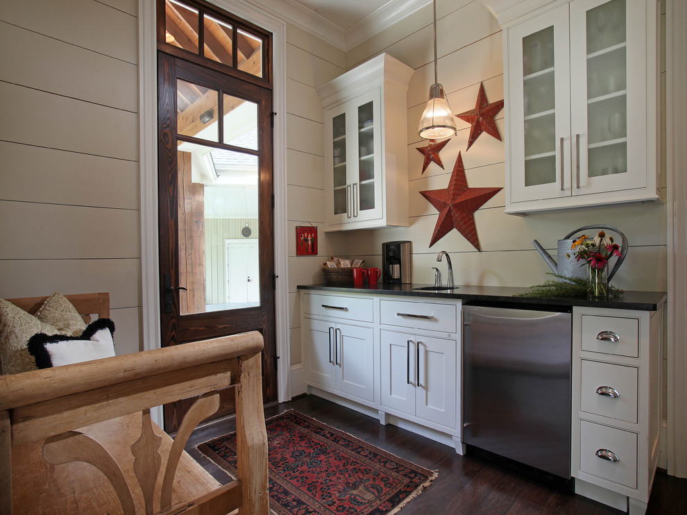 Country kitchen in Atlanta with stainless steel appliances.