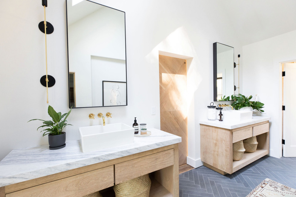 Country bathroom in San Francisco with flat-panel cabinets, light wood cabinets, white walls, a vessel sink, grey floor and white benchtops.