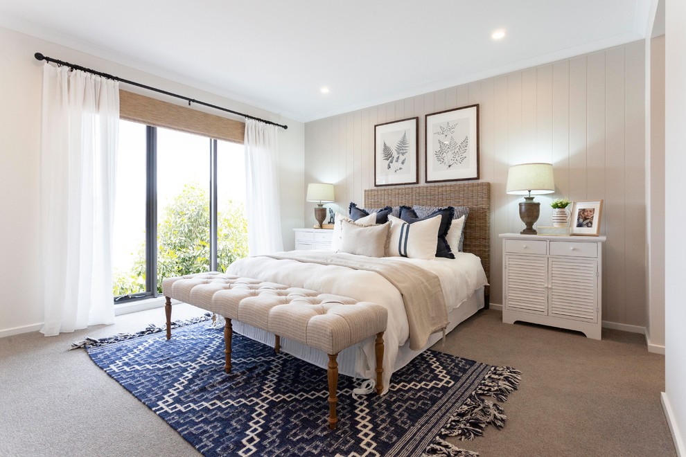 Photo of a transitional master bedroom in Melbourne with beige walls, carpet, no fireplace and beige floor.