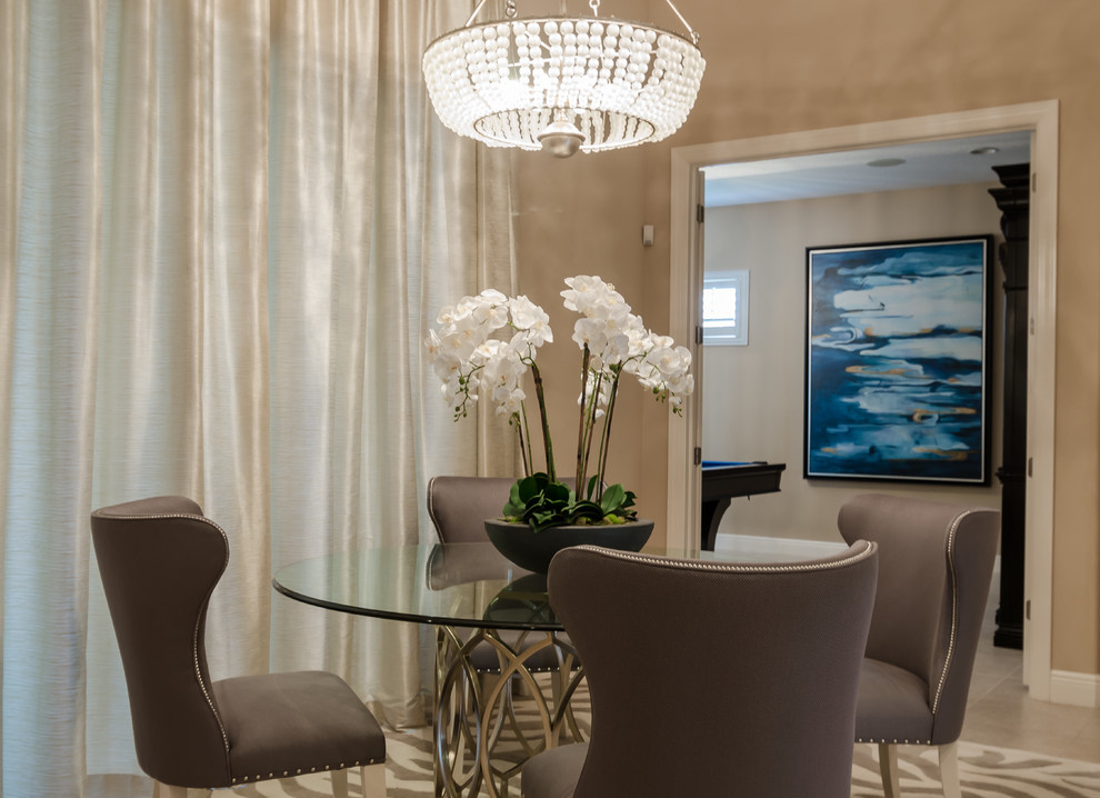 Mid-sized transitional ceramic floor enclosed dining room photo in Tampa with beige walls