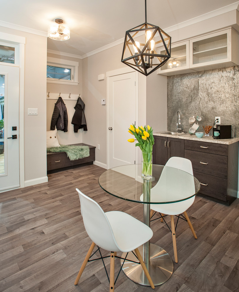 Example of a small transitional vinyl floor and multicolored floor kitchen/dining room combo design with beige walls