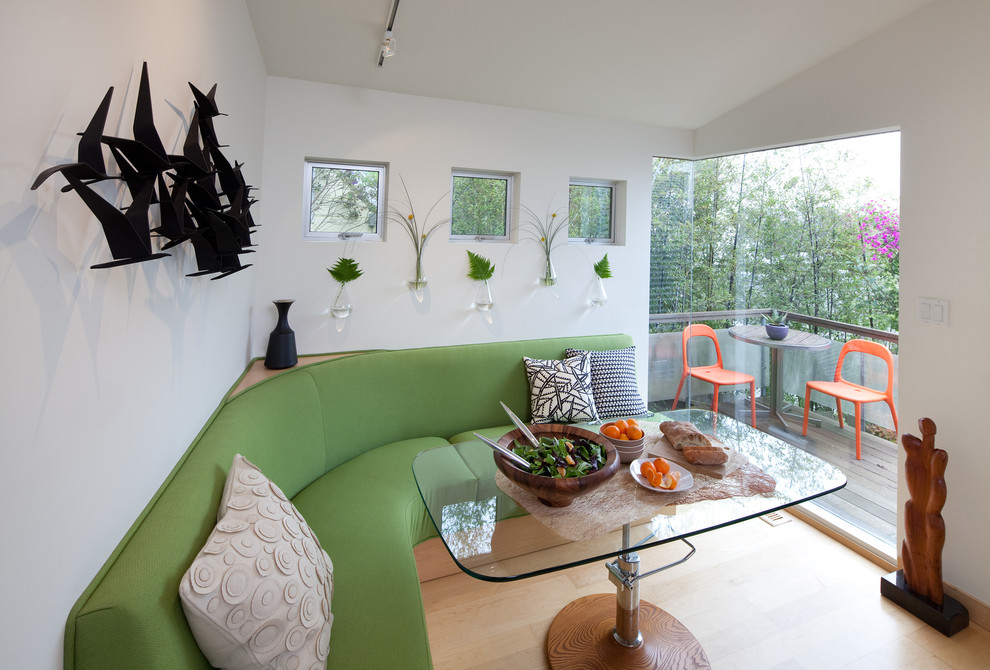 Inspiration for a mid-sized contemporary light wood floor and beige floor breakfast nook remodel in San Francisco with white walls and no fireplace