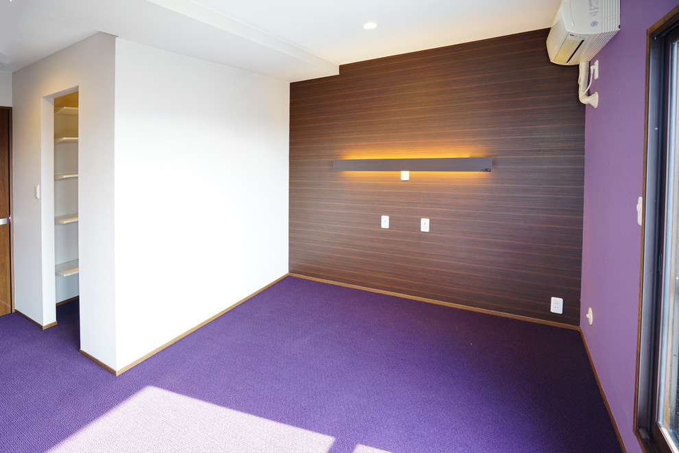 Inspiration for a mid-sized modern master bedroom in Other with purple walls, carpet, purple floor, no fireplace, wallpaper and wallpaper.