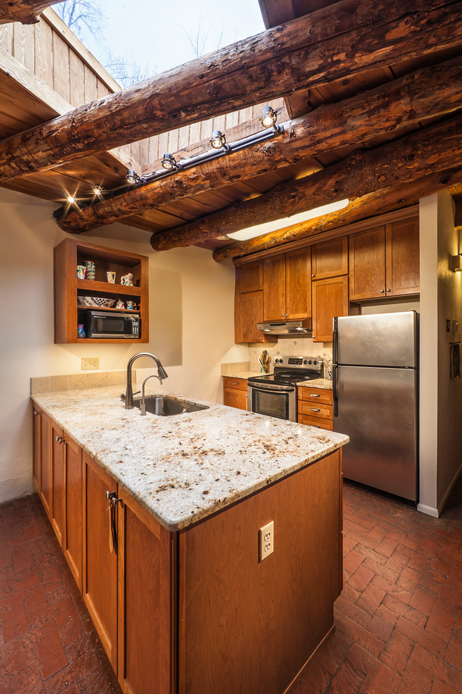 Kitchen - small rustic kitchen idea in Albuquerque