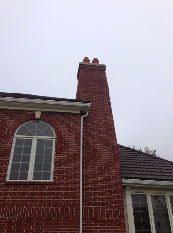 Inspiration for a mid-sized timeless two-story mixed siding exterior home remodel in Kansas City