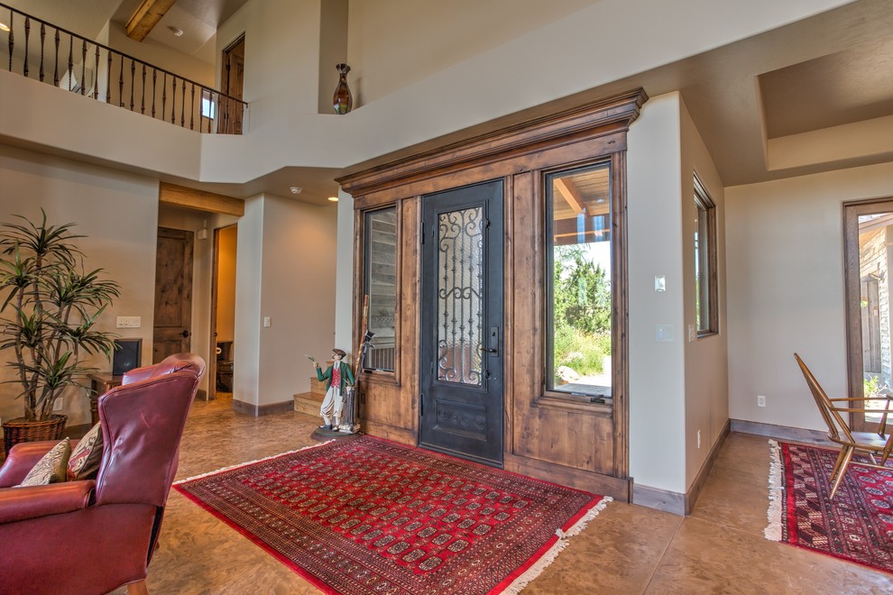 Inspiration for a rustic entryway remodel in Phoenix