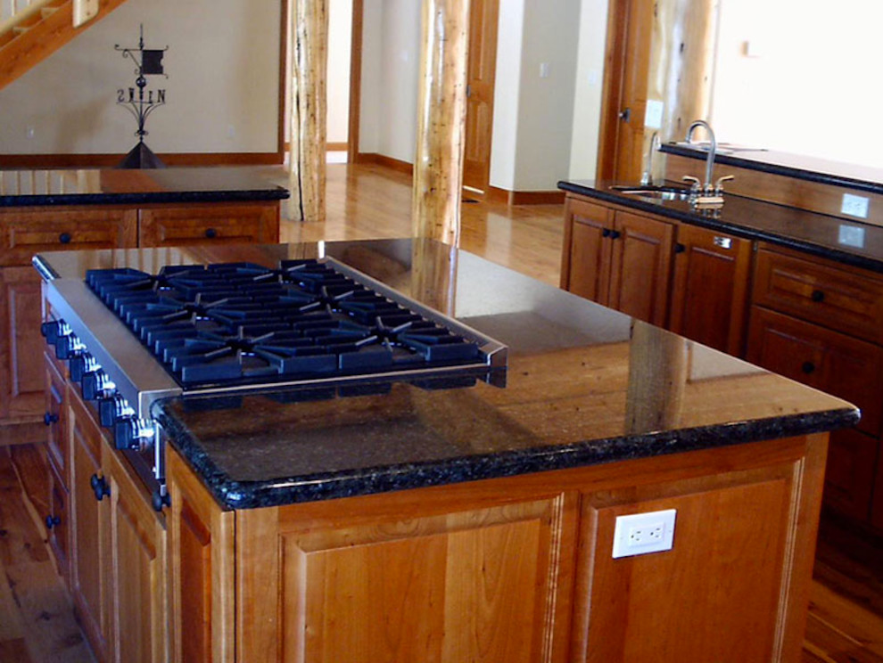 Example of a mountain style kitchen design in Denver