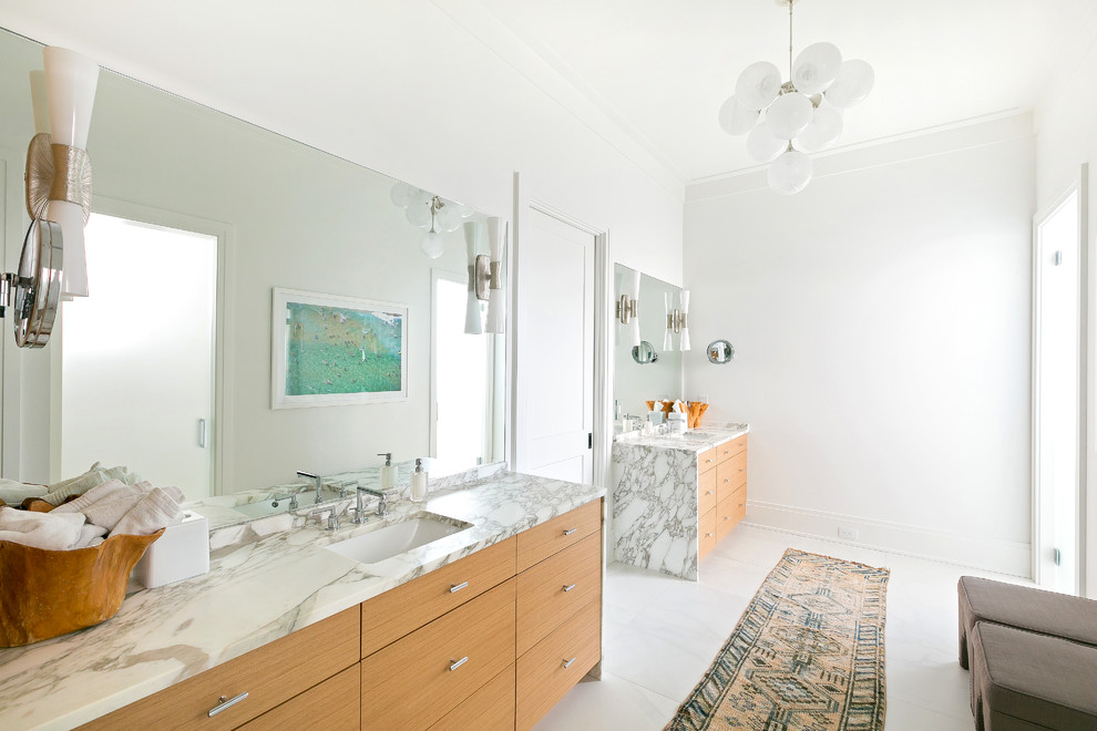 Design ideas for a contemporary bathroom in Charleston with flat-panel cabinets, medium wood cabinets and an undermount sink.