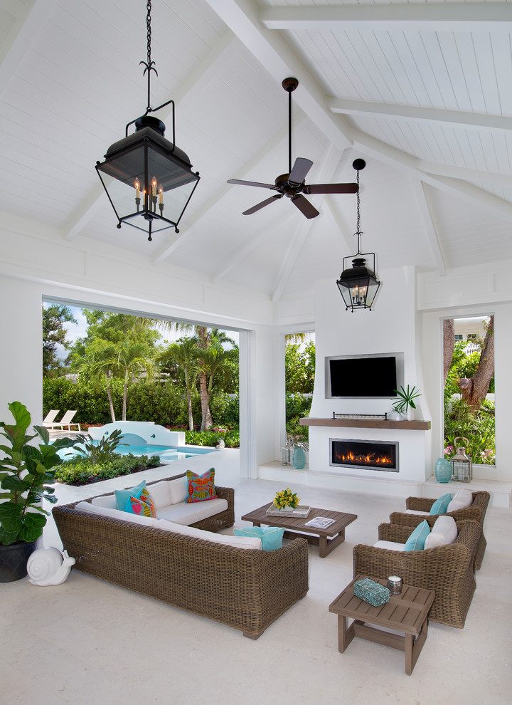 Inspiration for a large beach style backyard patio in Other with an outdoor kitchen and a roof extension.