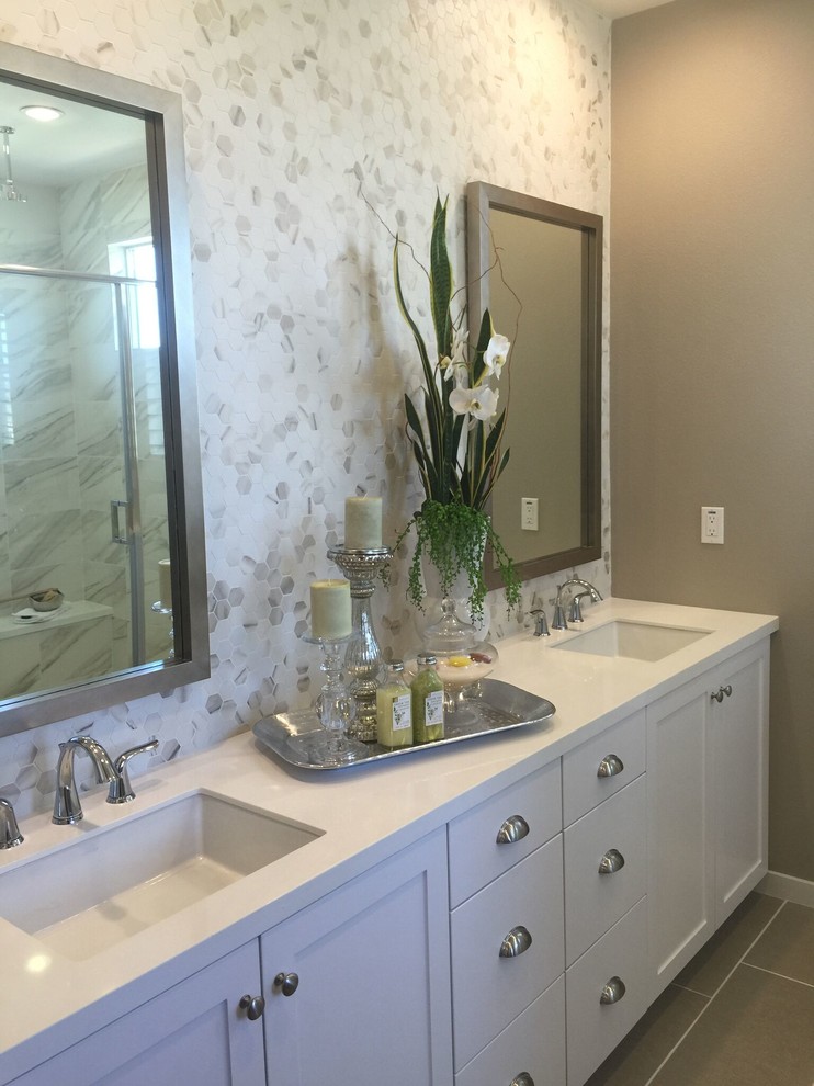Inspiration for a mid-sized traditional master bathroom in Los Angeles with shaker cabinets, white cabinets, gray tile, marble, brown walls, cement tiles, an undermount sink, engineered quartz benchtops, brown floor and white benchtops.