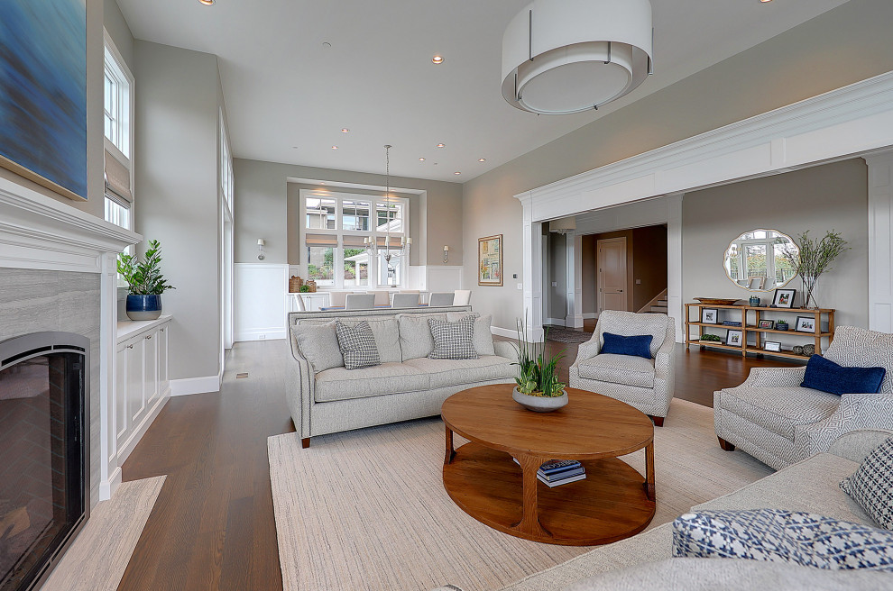 This is an example of a transitional family room in Portland.