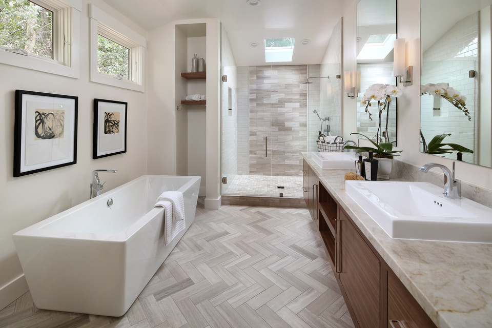 Mid-sized contemporary master bathroom in San Francisco with flat-panel cabinets, medium wood cabinets, a freestanding tub, an alcove shower, gray tile, porcelain tile, white walls, porcelain floors, a vessel sink, quartzite benchtops, beige floor and beige benchtops.