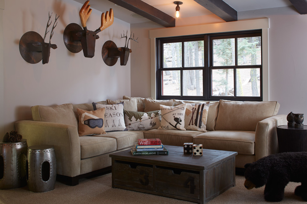 This is an example of a country family room in San Francisco with beige walls and carpet.