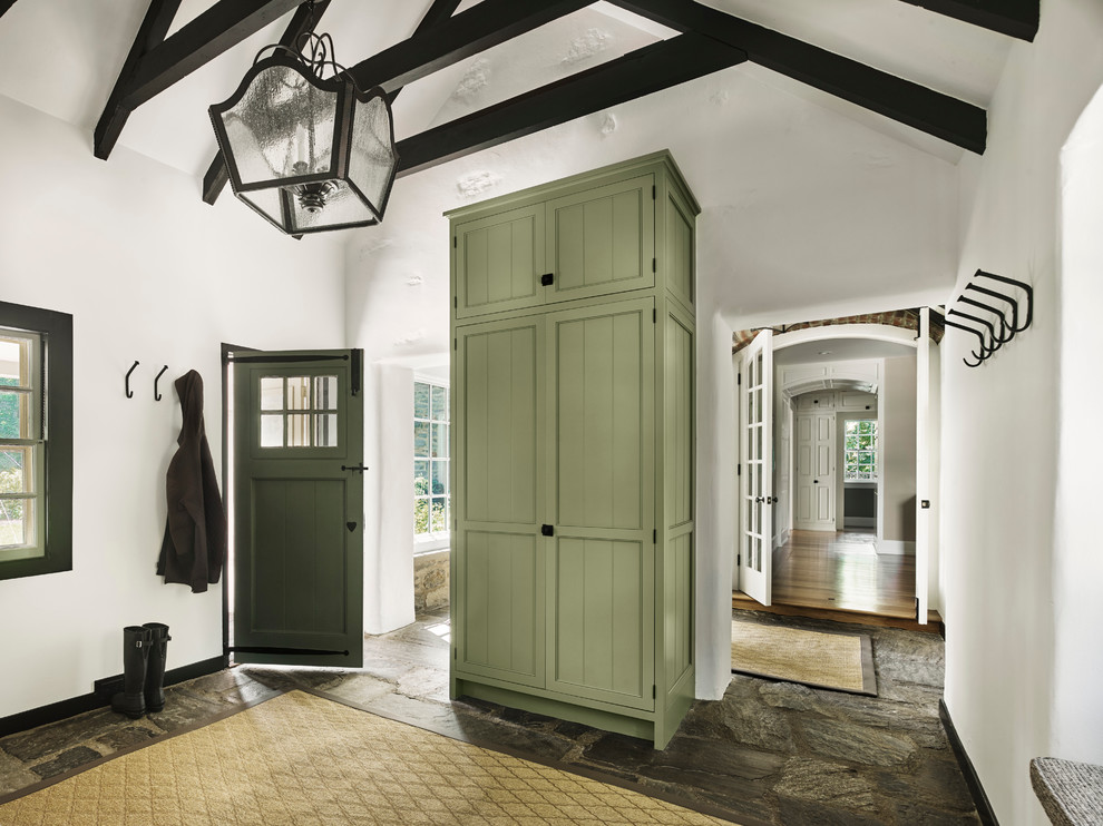 Transitional mudroom photo in Philadelphia with white walls