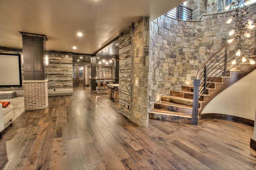 Inspiration for an expansive country wood curved staircase in Denver with wood risers.