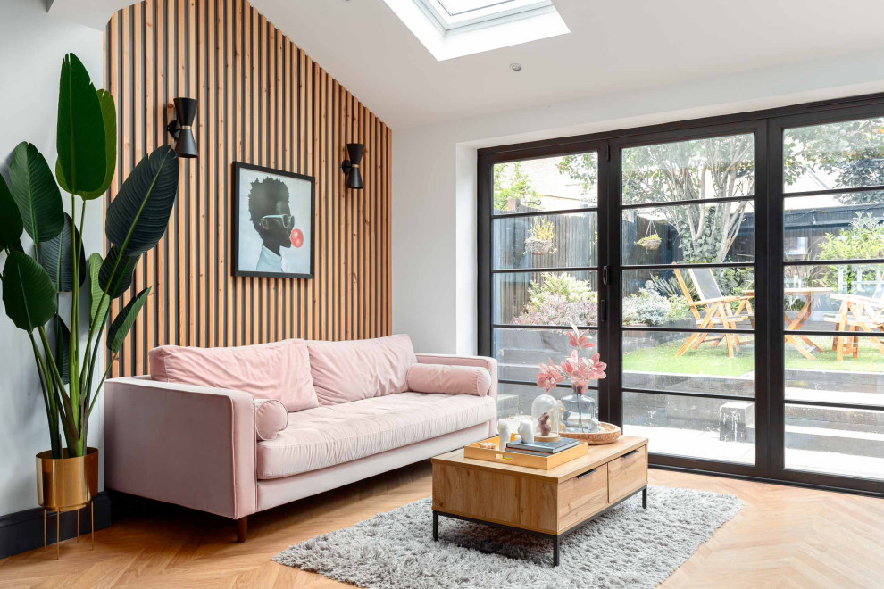 This is an example of a contemporary living room in Surrey.