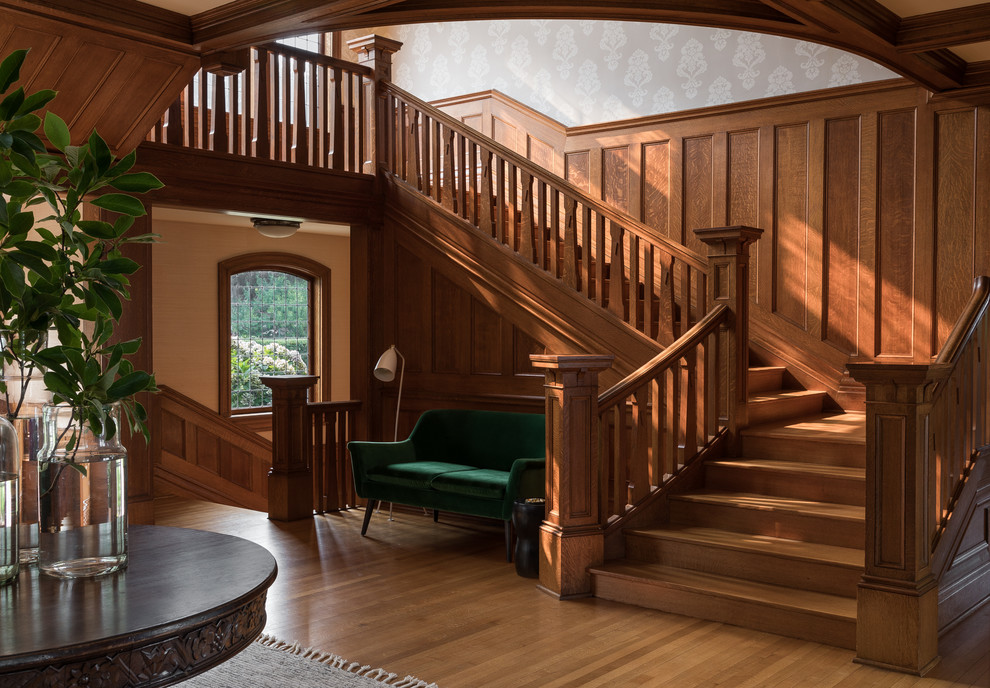 Design ideas for a large arts and crafts wood l-shaped staircase in Seattle with wood risers and wood railing.
