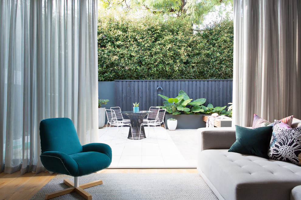 This is an example of a contemporary living room in Sydney.