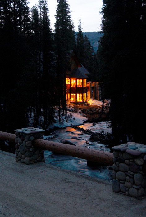 Inspiration for a large rustic two-story wood exterior home remodel