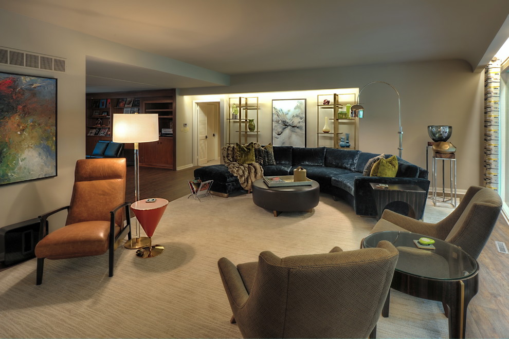 Inspiration for a large midcentury open concept living room in Omaha with beige walls, vinyl floors, a standard fireplace, a brick fireplace surround, a wall-mounted tv and brown floor.