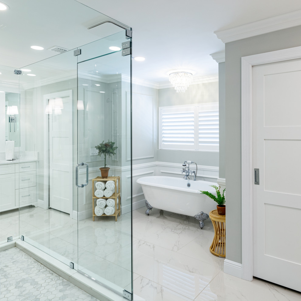 Large country family bathroom in Miami with shaker cabinets, white cabinets, a walk-in shower, a two-piece toilet, white tiles, porcelain tiles, white walls, porcelain flooring, engineered stone worktops, white floors, a hinged door, white worktops, double sinks and a built in vanity unit.