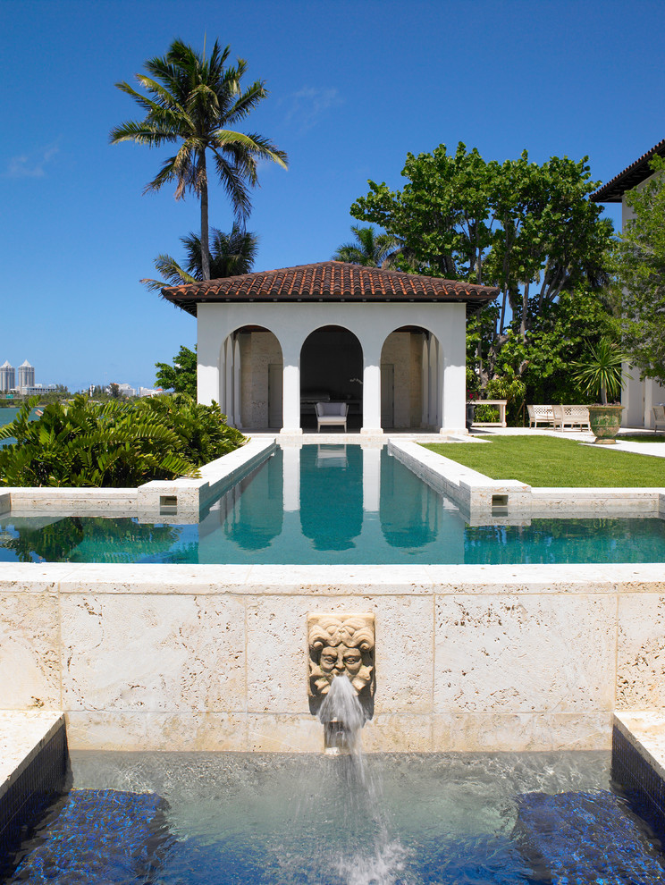 Inspiration for a mediterranean custom-shaped pool in Miami.