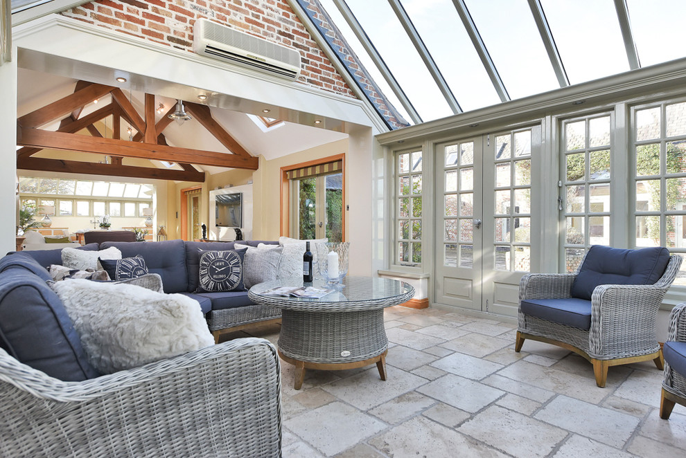 Design ideas for a mid-sized country sunroom in Other with a glass ceiling and grey floor.