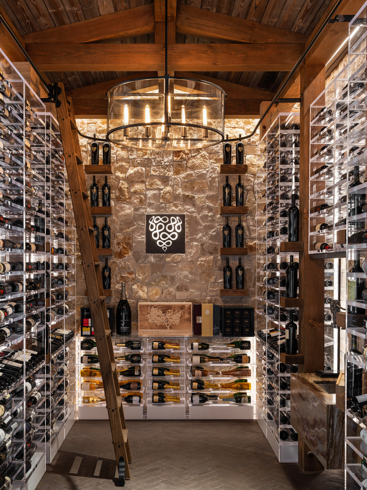 This is an example of a country wine cellar in San Francisco with display racks and grey floor.