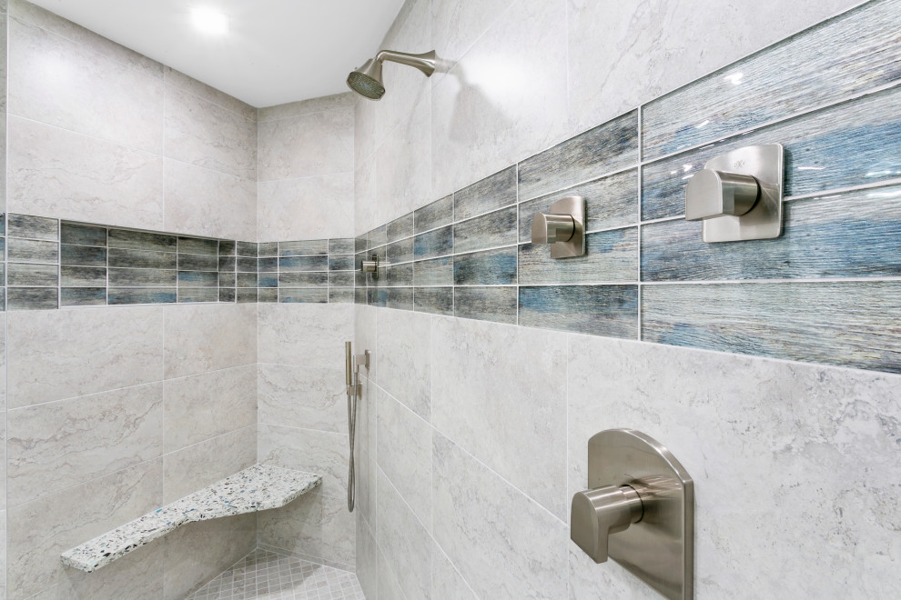 Transitional master multicolored tile and porcelain tile porcelain tile, gray floor and double-sink bathroom photo in Miami with flat-panel cabinets, gray cabinets, a one-piece toilet, gray walls, an undermount sink, terrazzo countertops, multicolored countertops and a built-in vanity