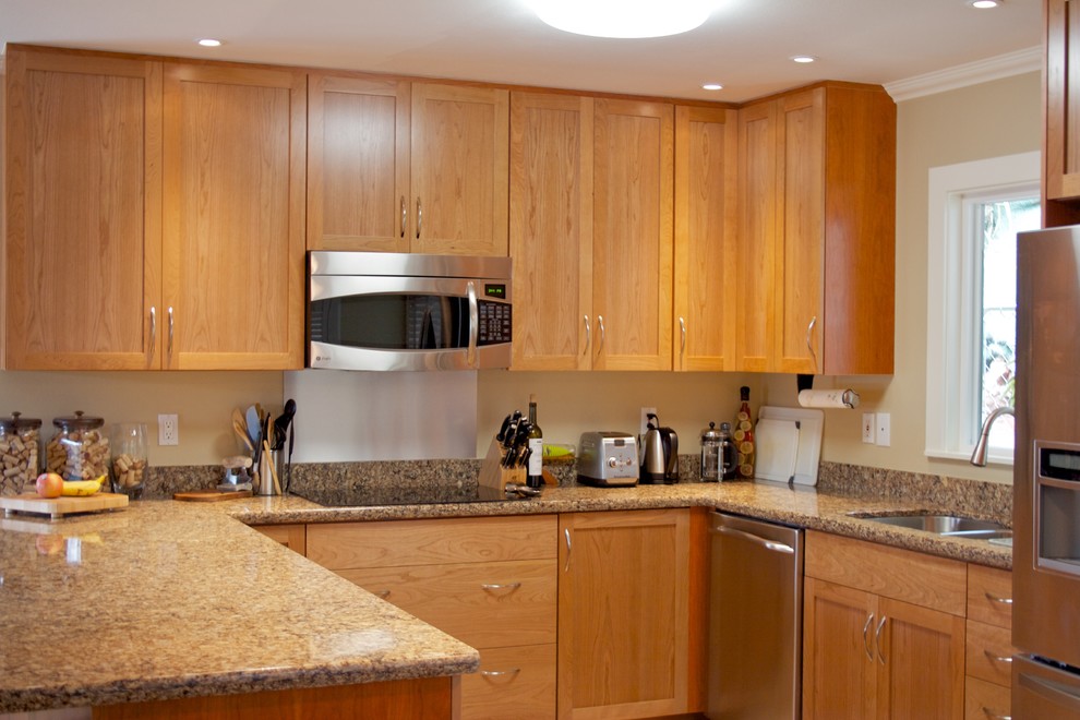 Inspiration for a transitional kitchen remodel in Hawaii with a drop-in sink, shaker cabinets and stainless steel appliances