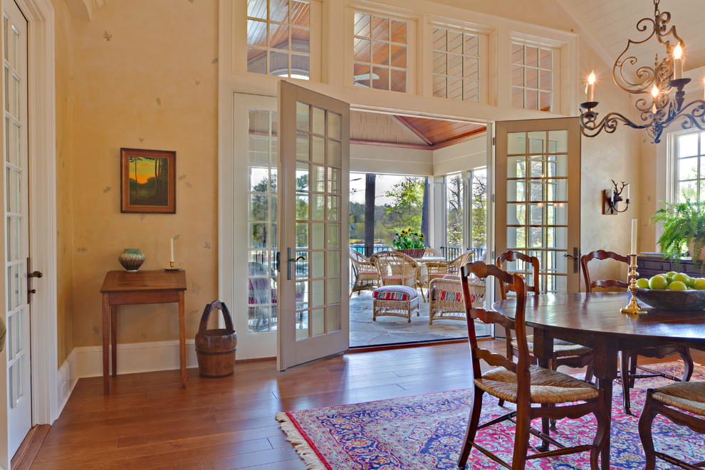 Kitchen/dining room combo - large traditional medium tone wood floor kitchen/dining room combo idea in Atlanta with beige walls