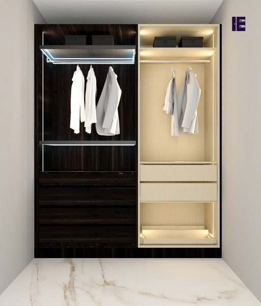 Large modern standard wardrobe in London with glass-front cabinets, dark wood cabinets and feature lighting.
