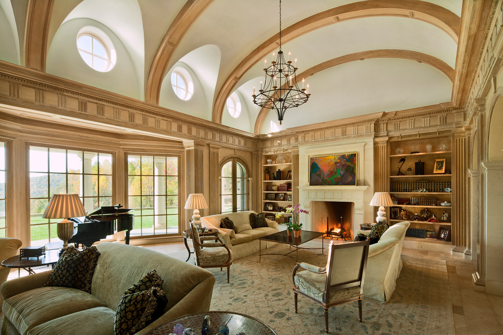 Photo of an expansive traditional living room in Other with a library, a standard fireplace and no tv.