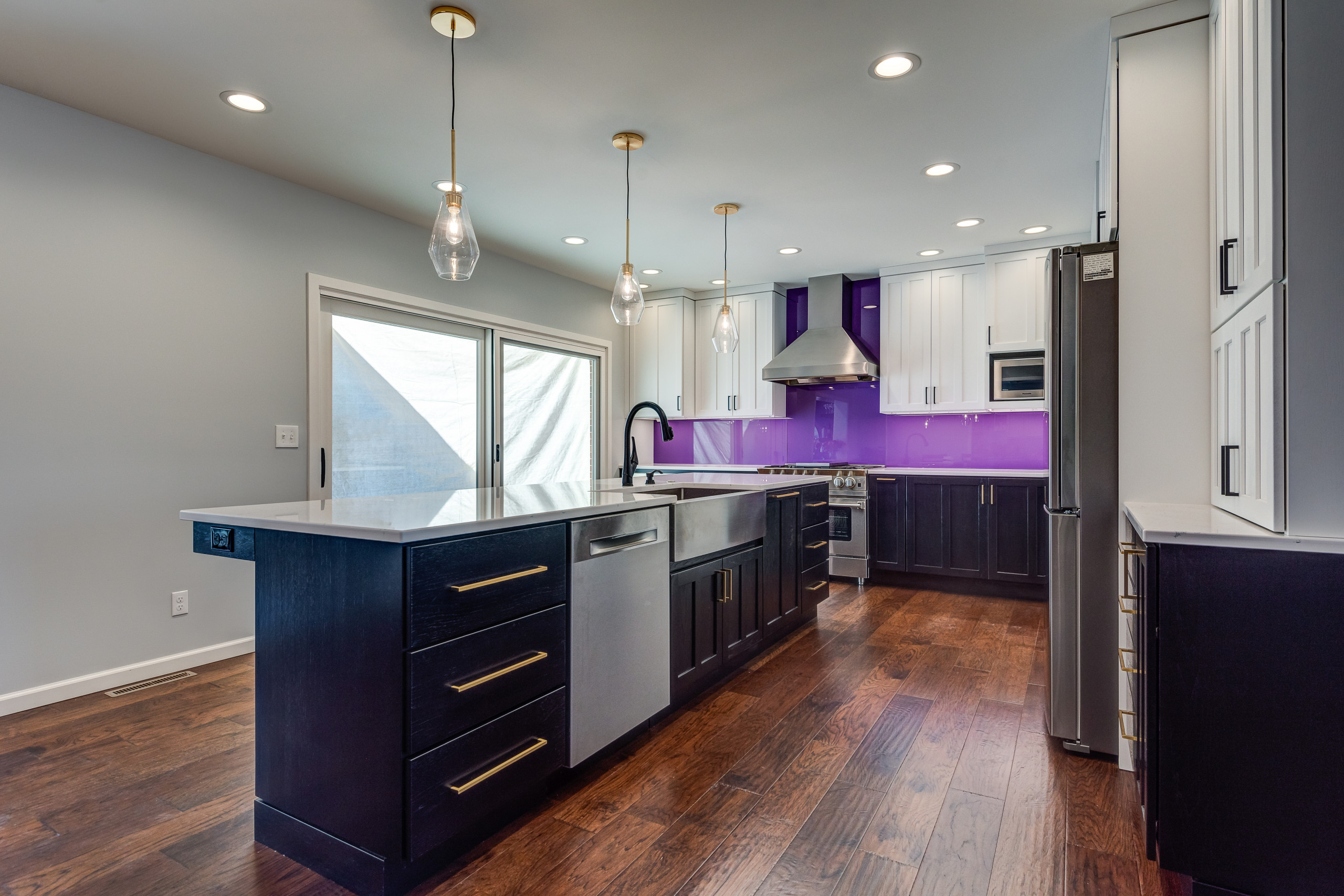 With gorgeous cabinetry, neutral color palette wall tones and metallic accents this contemporary kitchen has a subtle elegance that will never go out of style. We blended aspects of the design with ot