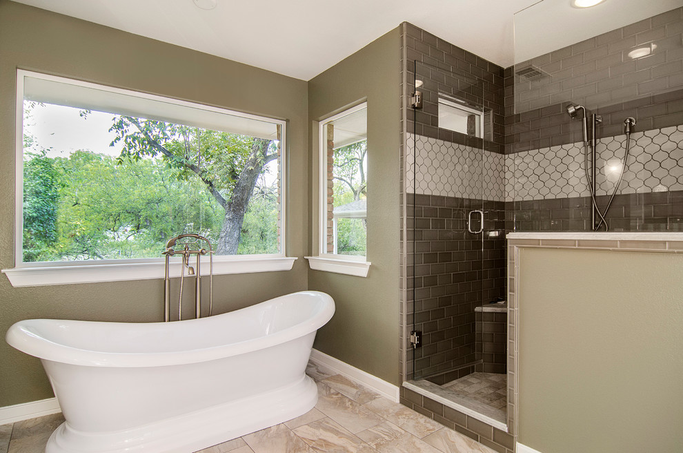 This is an example of a mid-sized traditional master bathroom in Dallas with a drop-in sink, shaker cabinets, dark wood cabinets, quartzite benchtops, a freestanding tub, a corner shower, a two-piece toilet, beige tile, porcelain tile, green walls and light hardwood floors.