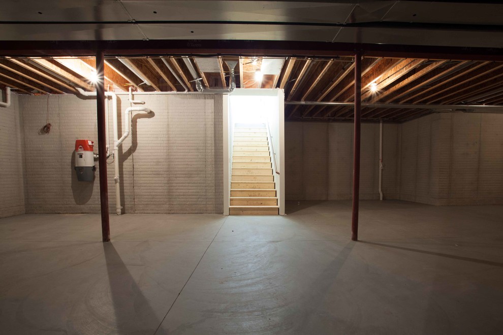 Inspiration for a transitional basement remodel in Milwaukee