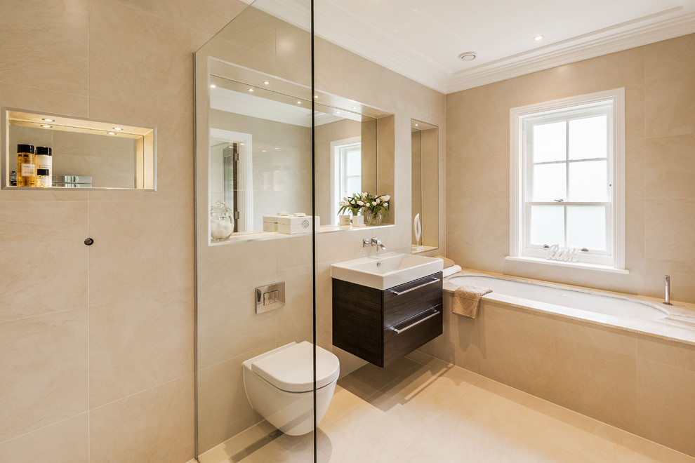 Inspiration for a contemporary bathroom in Surrey with flat-panel cabinets, dark wood cabinets, an alcove tub, an open shower, a wall-mount toilet, beige tile, beige walls, a console sink and an open shower.