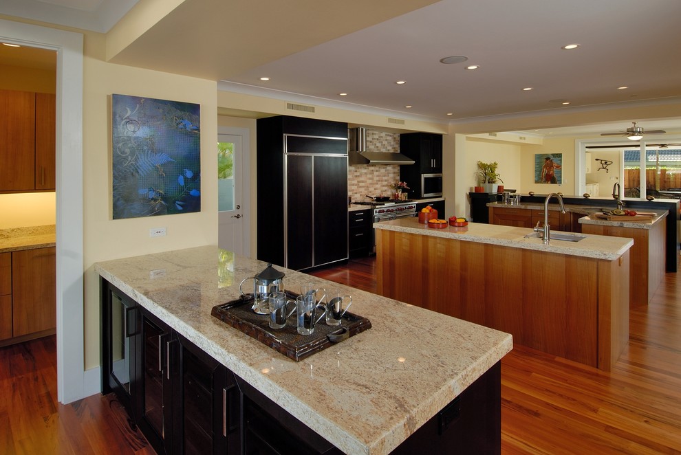 Contemporary kitchen in Hawaii with granite benchtops.